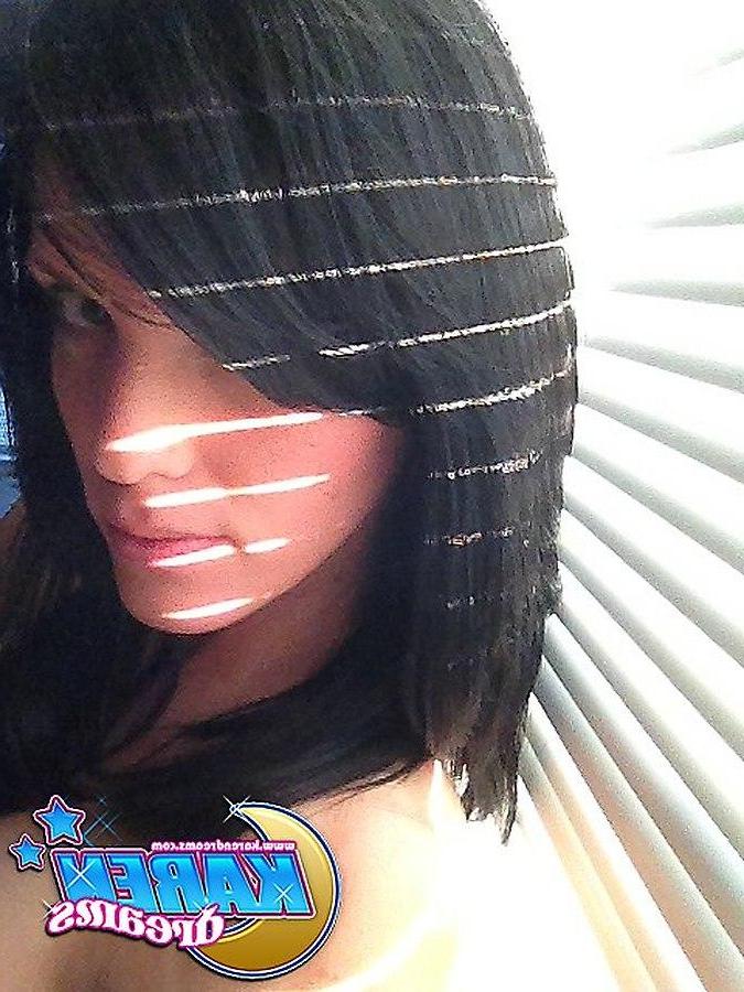 20P Karen Dreams takes pics of her big boobs and round ass by the window