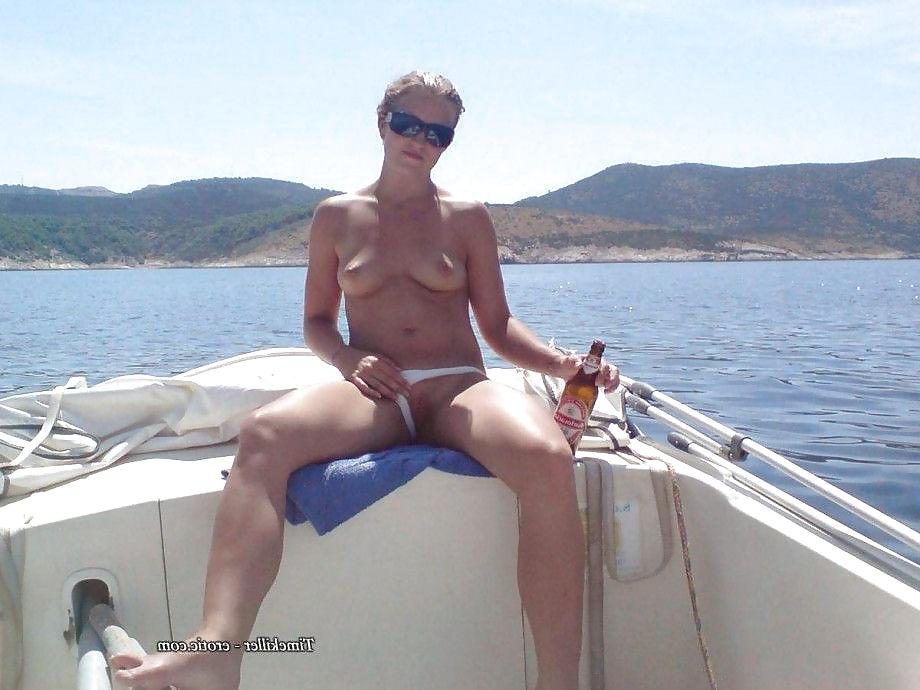 25P Topless at the beach