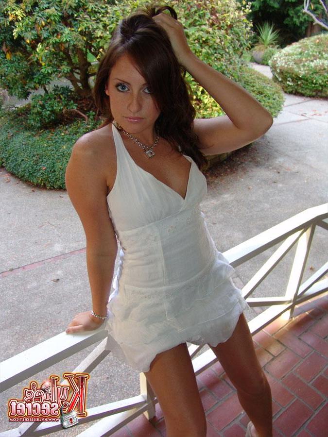12P Kylie's Secret teases in and out of her white summer dress