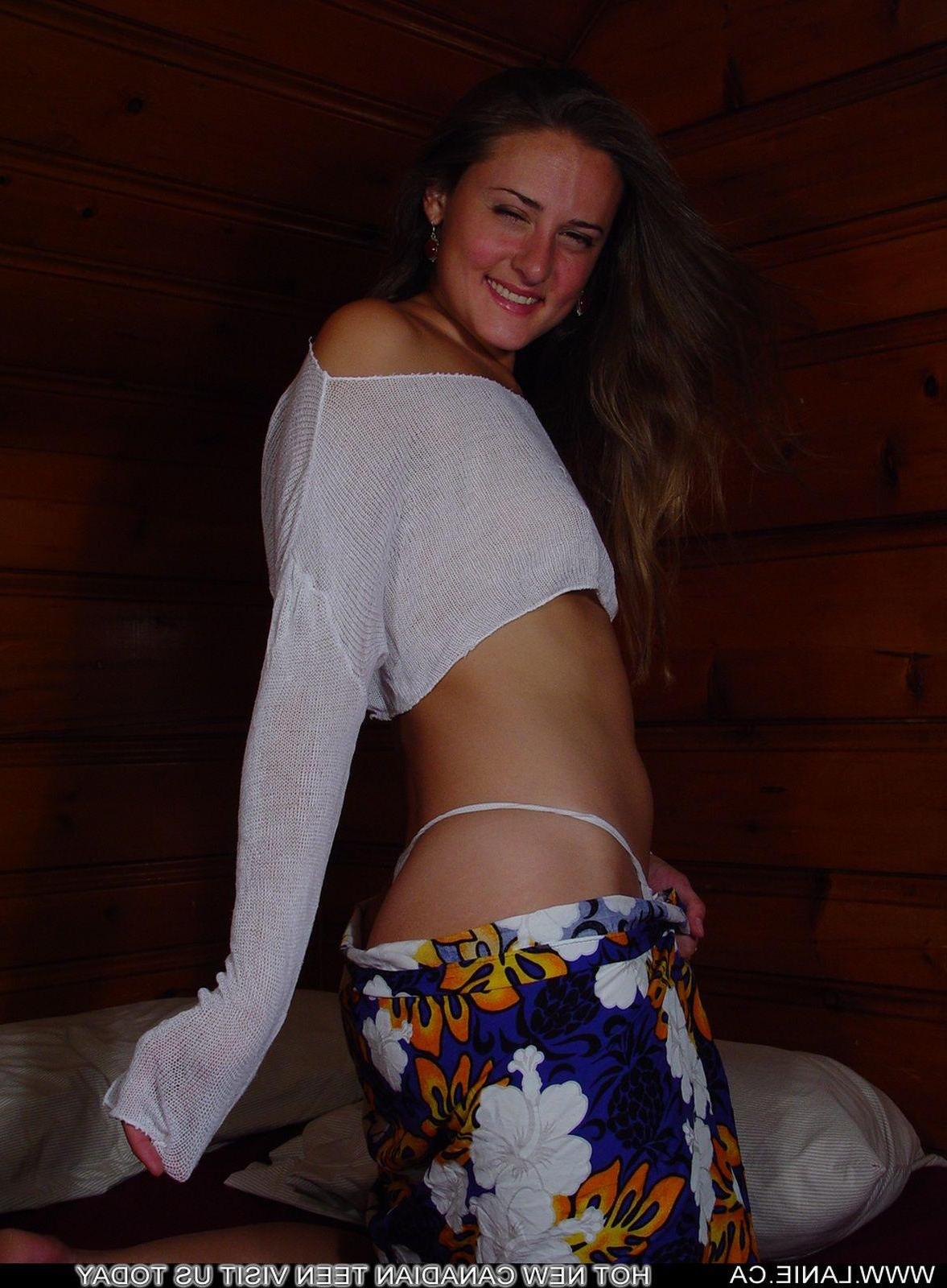 20P Pictures of Lanie.ca teasing with her tits and legs