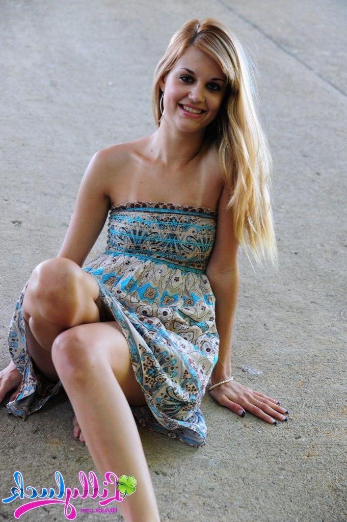 20P Pictures of teen model Lilly Luck spreading her legs outside