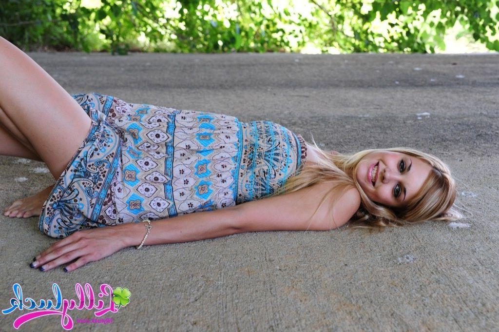 20P Pictures of teen model Lilly Luck spreading her legs outside
