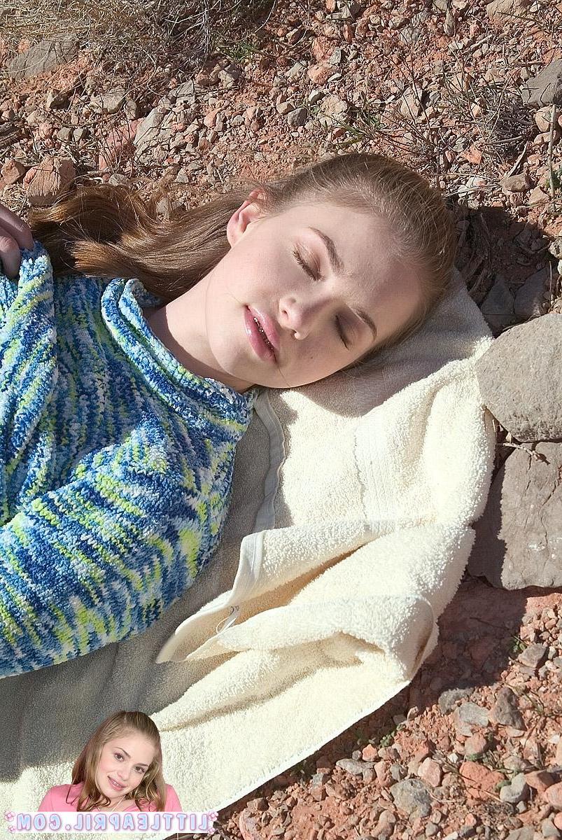20P Pictures of Little April flashing her small titties outside