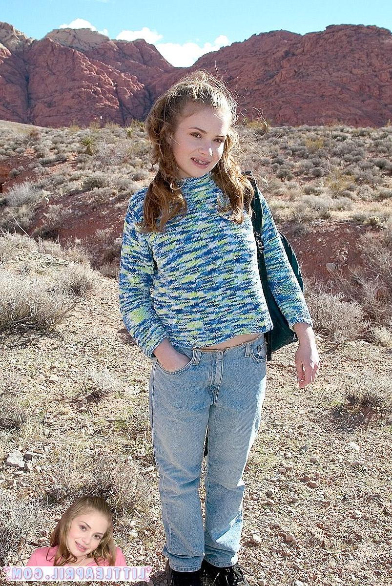 20P Pictures of Little April flashing her small titties outside