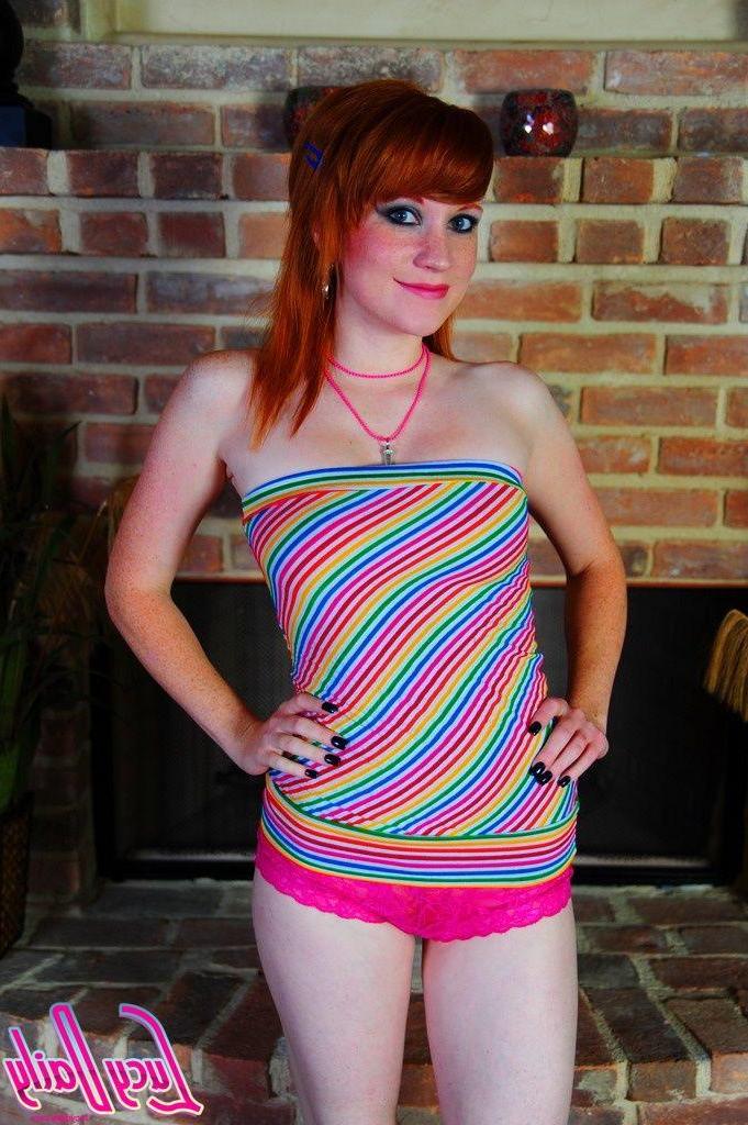 20P Pictures of redhead teen Lucy Daily spreading her legs for your cock
