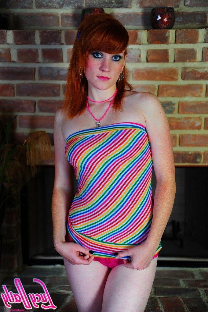 20P Pictures of redhead teen Lucy Daily spreading her legs for your cock