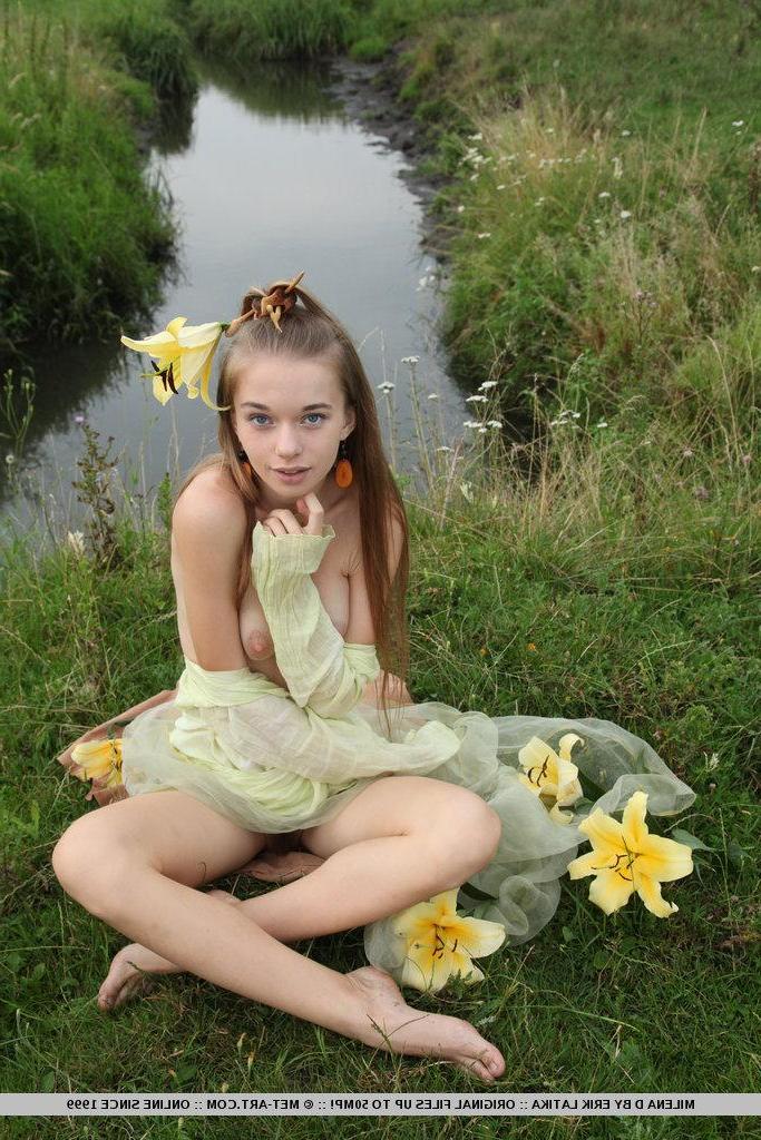 18P Pictures of teen girl Milena D showing off her natural bush outside