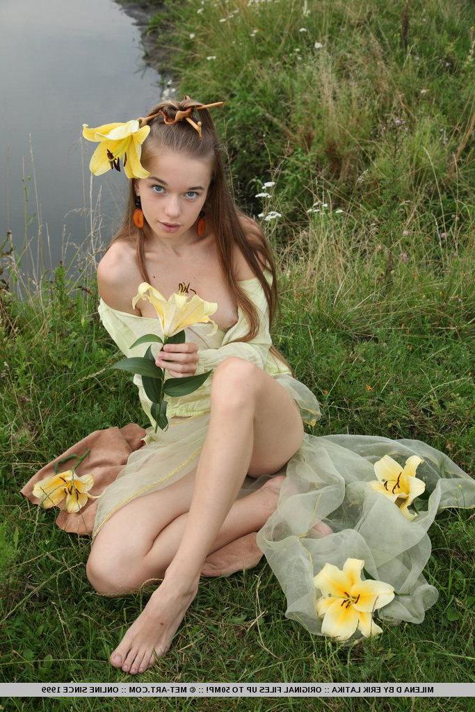 18P Pictures of teen girl Milena D showing off her natural bush outside