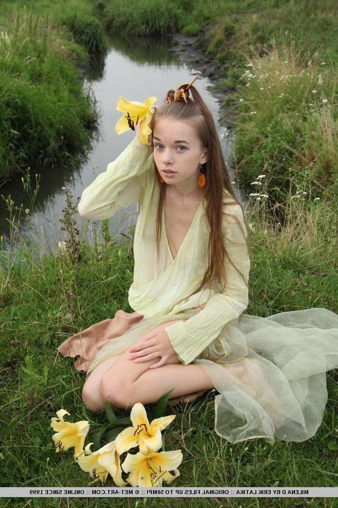 18P Pictures of teen girl Milena D showing off her natural bush outside