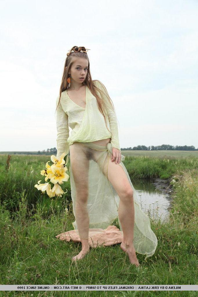 18P Pictures of teen girl Milena D showing off her natural bush outside