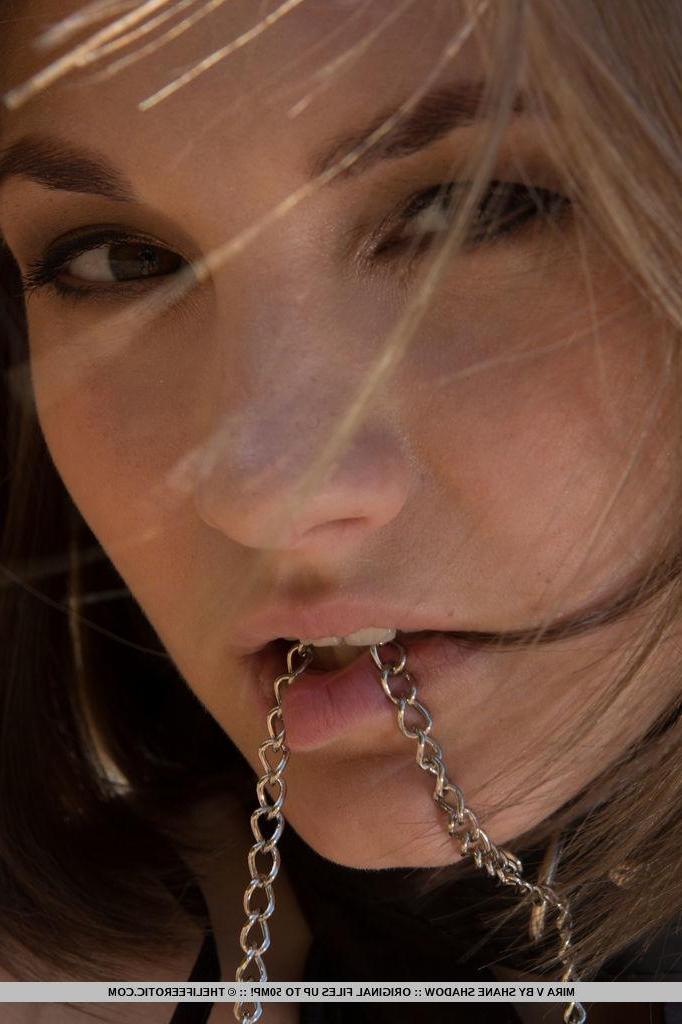 16P Brunette girl Mira D gets kinky with her clamps outside on a beach