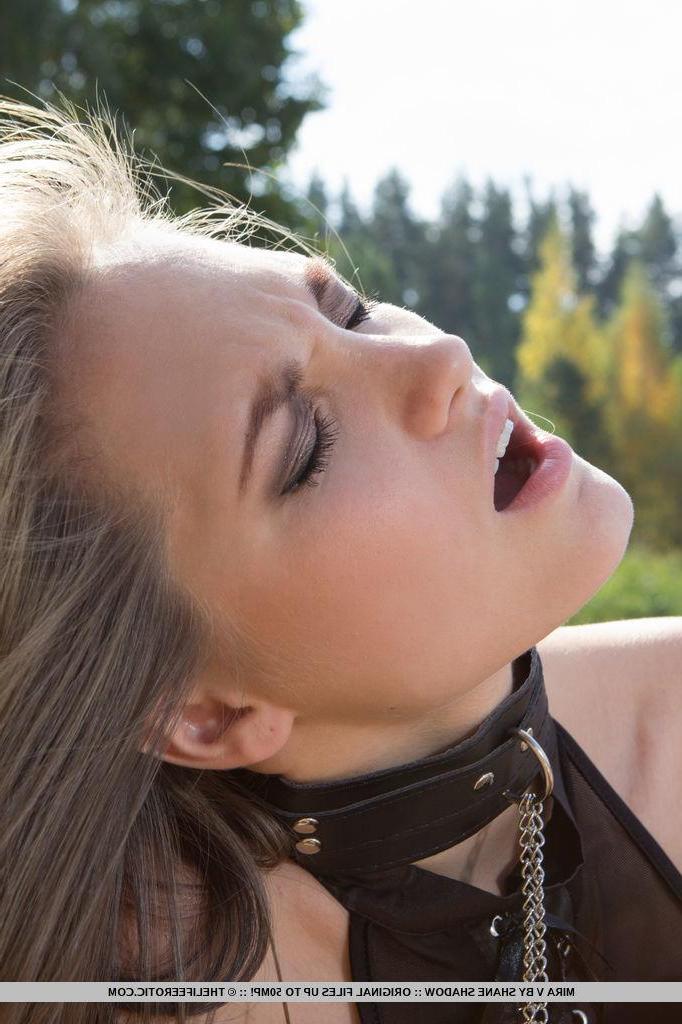 16P Brunette girl Mira D gets kinky with her clamps outside on a beach