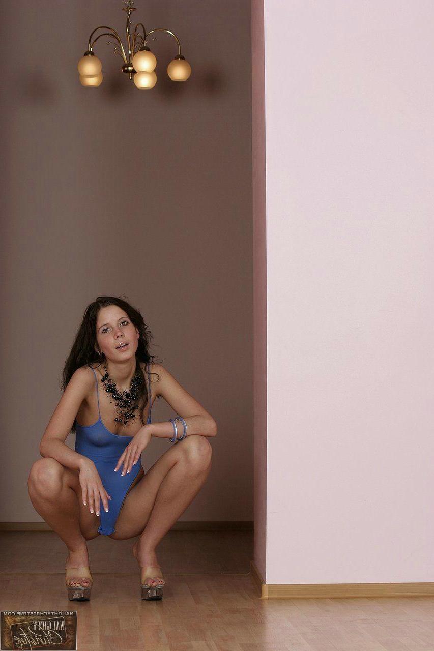 15P Pictures of Naughty Christine showing off her sexy legs