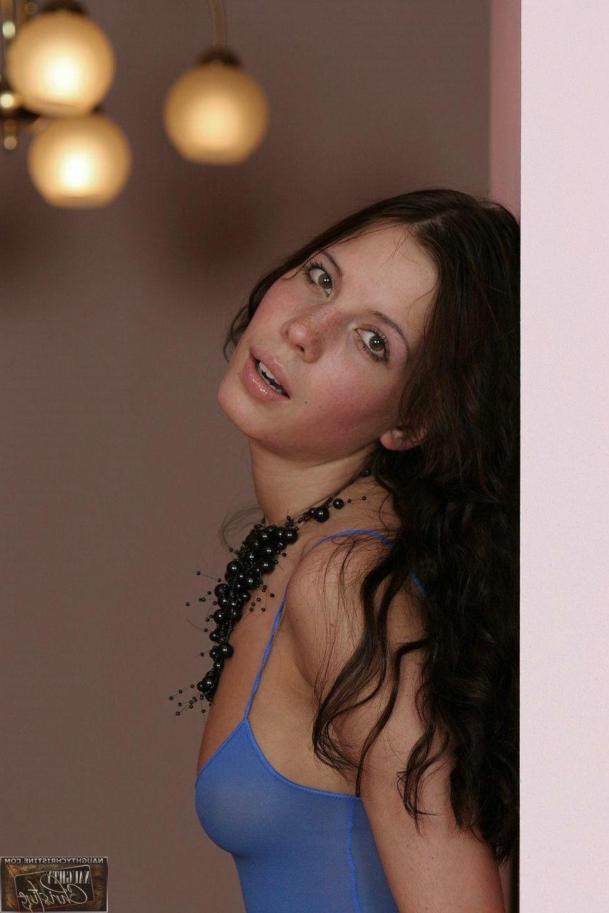 15P Pictures of Naughty Christine showing off her sexy legs
