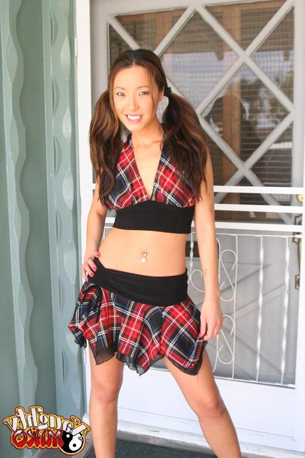 20P Pictures of an asian schoolgirl getting naked