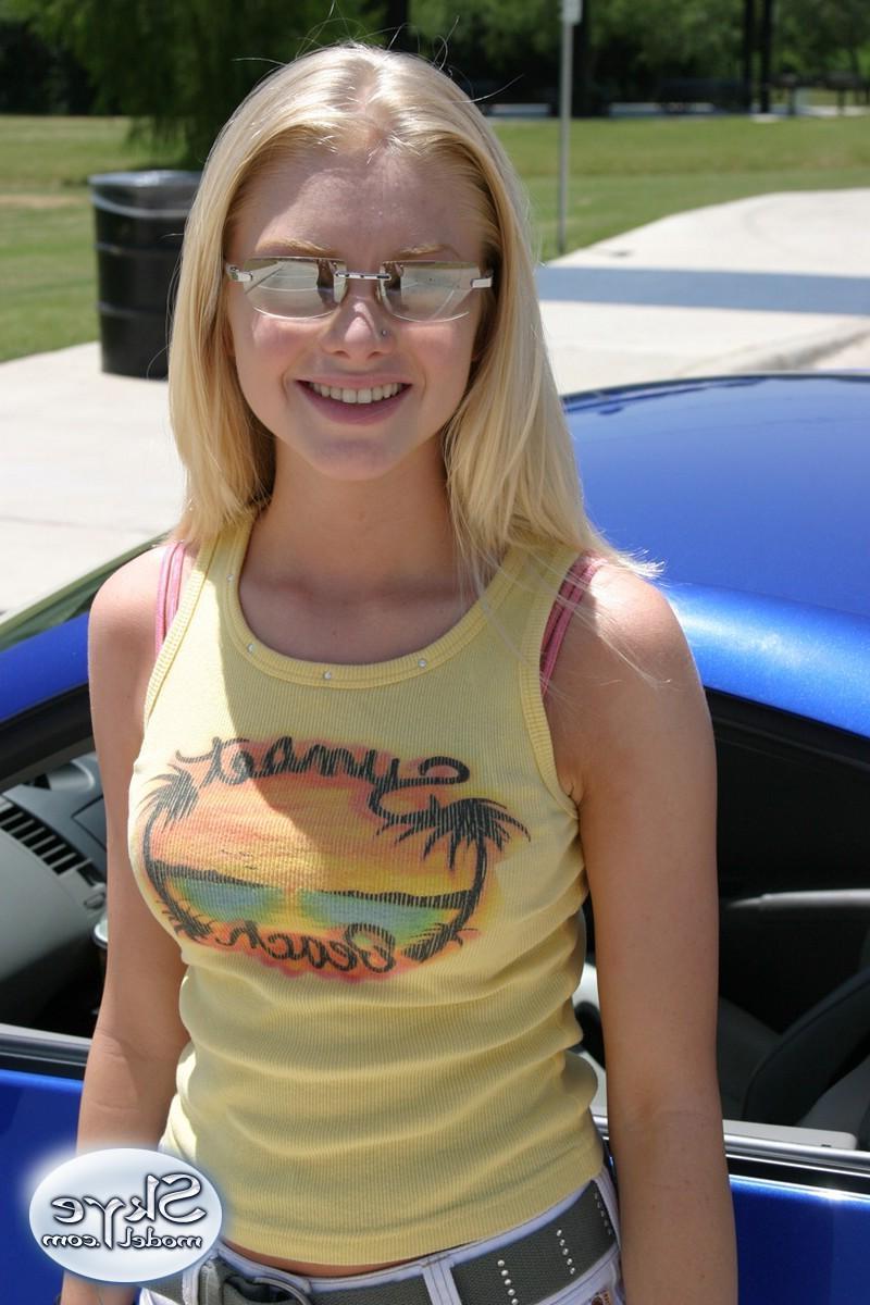 12P Blonde teen Skye Model shows off her tight teen body by her friends car