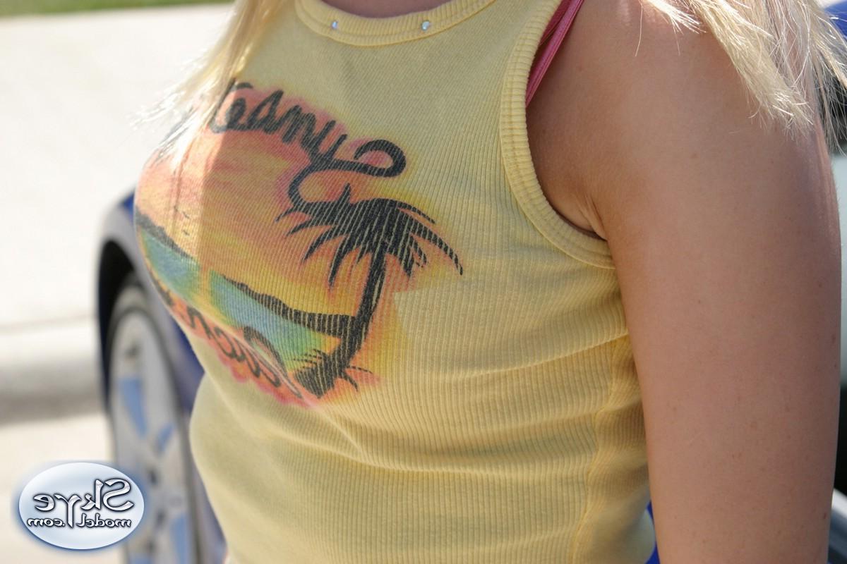 12P Blonde teen Skye Model shows off her tight teen body by her friends car