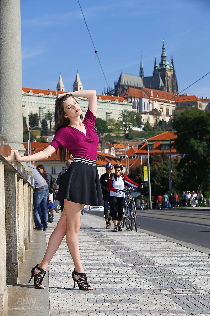 16P Brunette girl Serena shows off her sexy legs outside