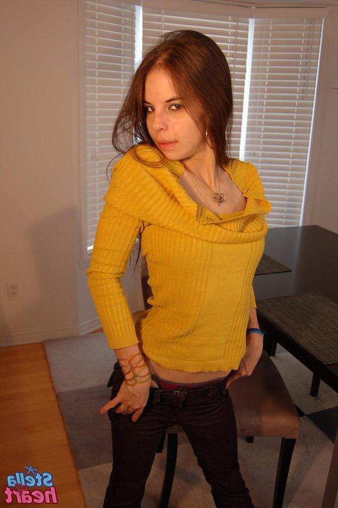 15P Pictures of teen porn girl Stella Heart showing off her small tits