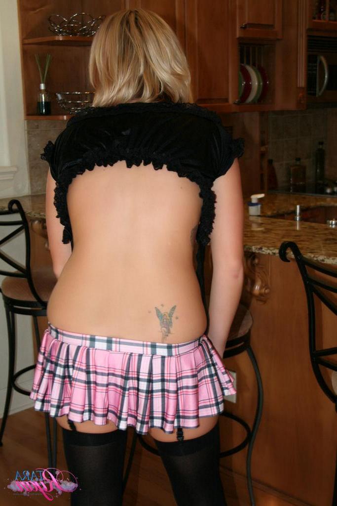 20P Pictures of teen schoolgirl Tara Ryan lifting her skirt