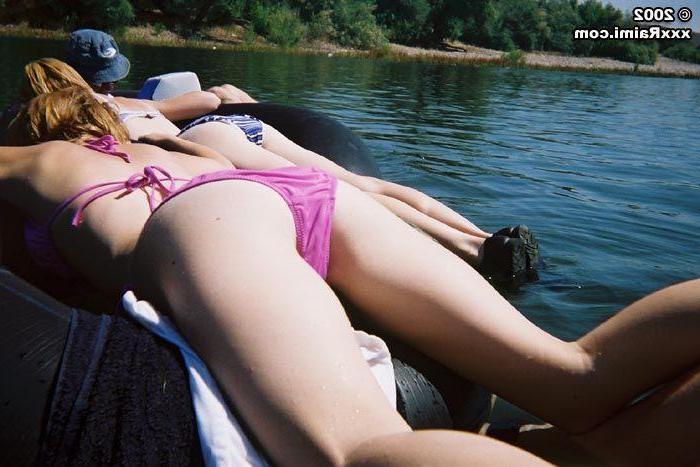 20P Pictures of Raimi and Taylor flashing their pussies on a raft