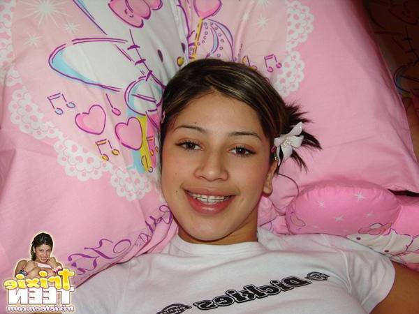 12P Trixie Teen gets a bit horny reading in bed and starts stripping