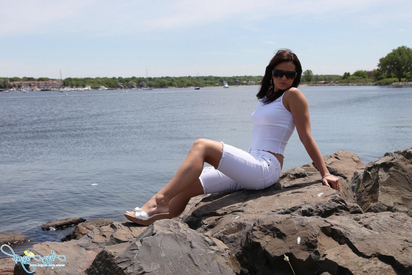 15P Ann Angel gives a tease outside with a little flash