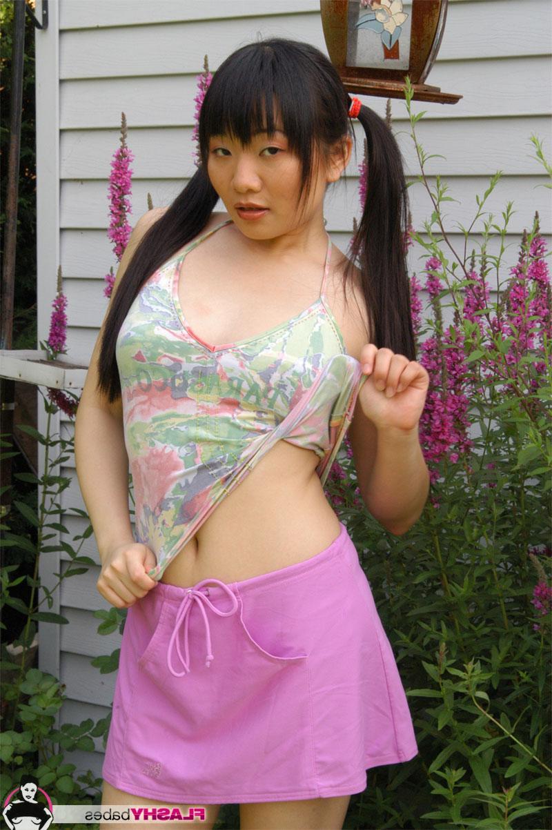20P Asian girl puts a dildo up her pussy