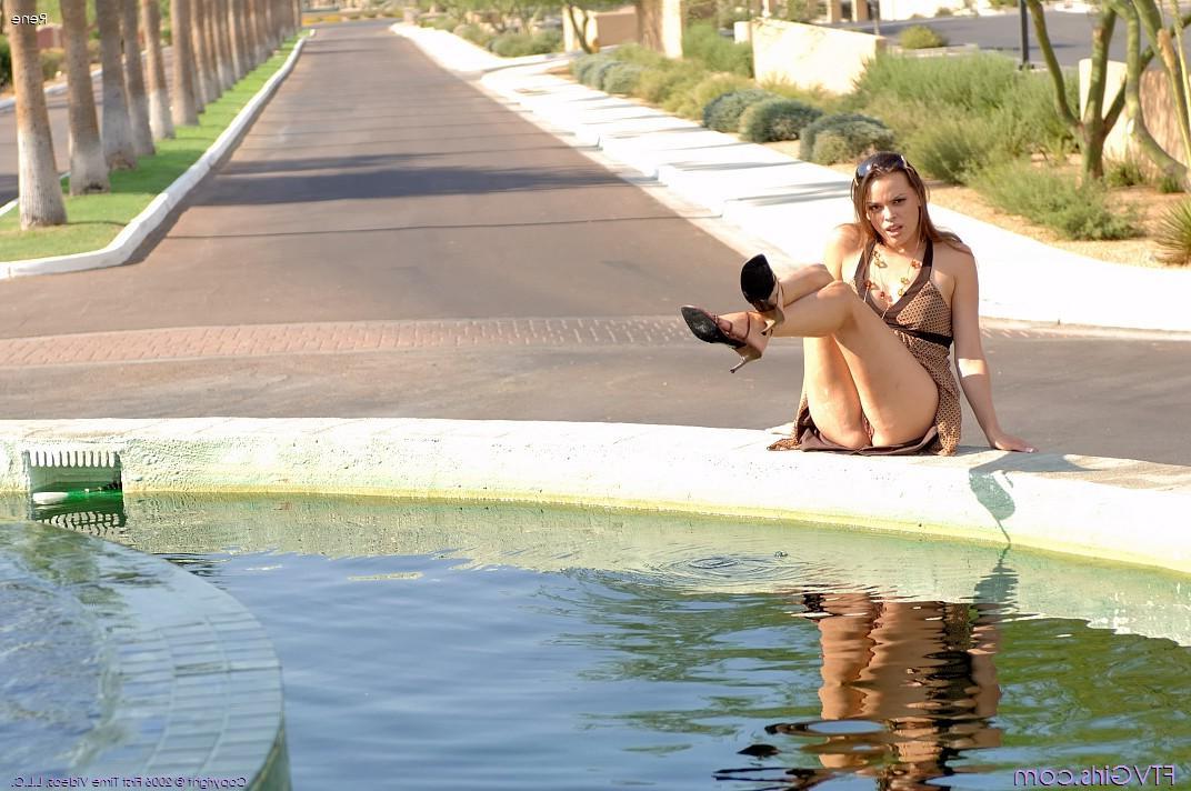 20P Pictures of Rene spreading her legs by the pool