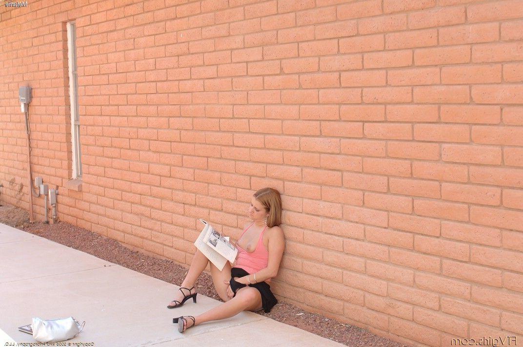20P Pictures of Melanie flashing her pussy outside