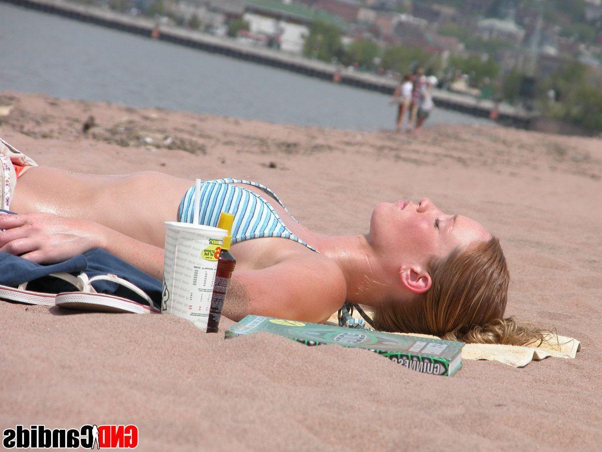 12P Pictures of hot bikini teens on a beach
