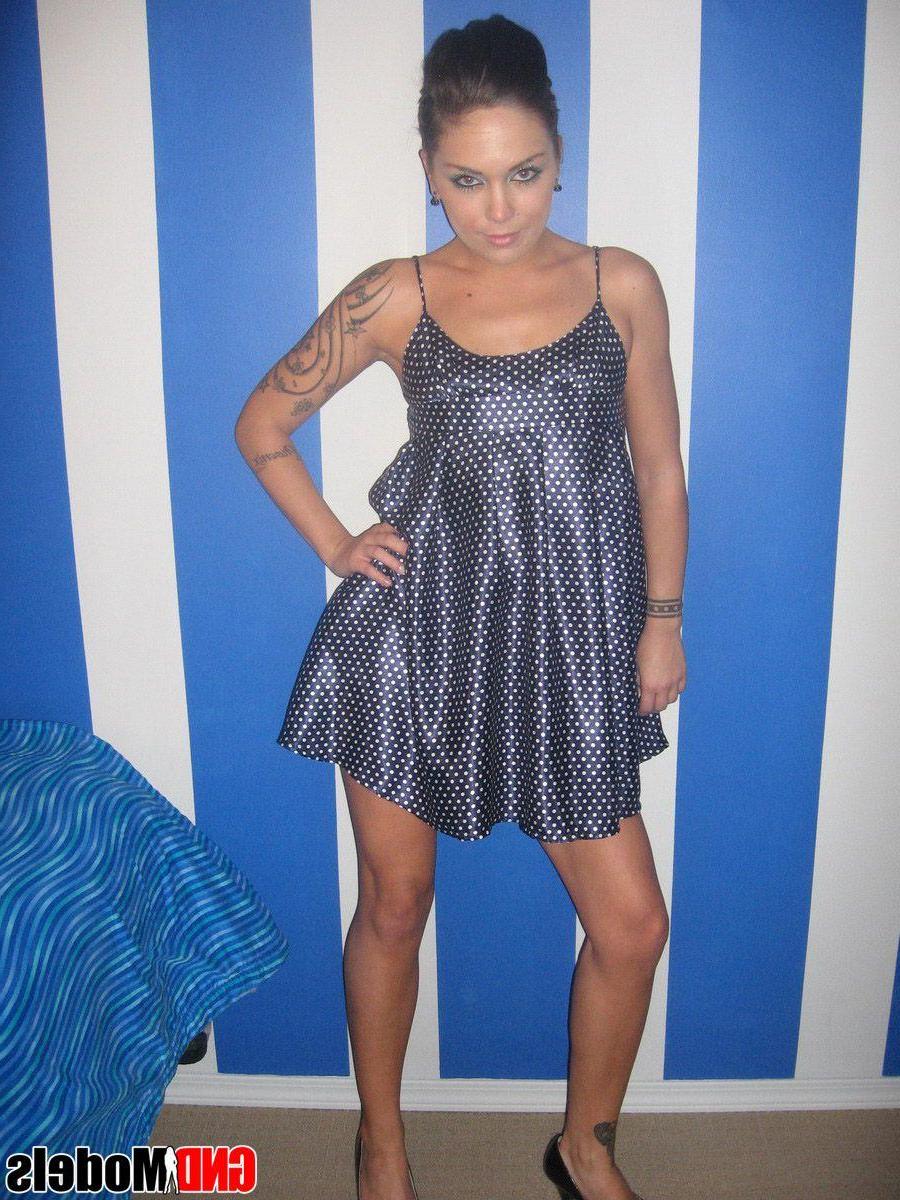 12P Pictures of a brunette girl showing her legs