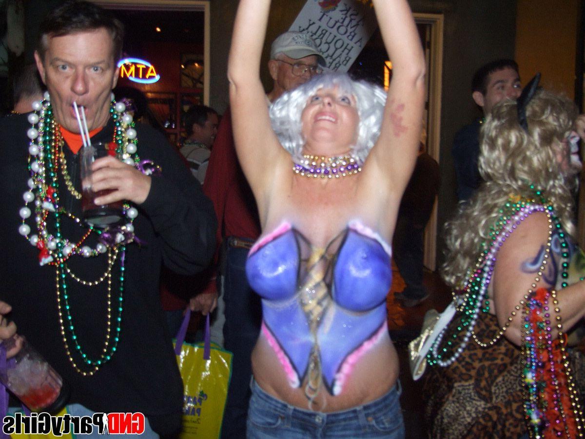 12P Pictures of party teens exposing their titties in public