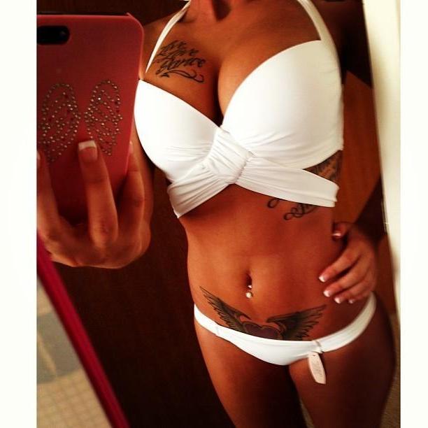 15P Busty inked GF displays her juggs and sexy ass