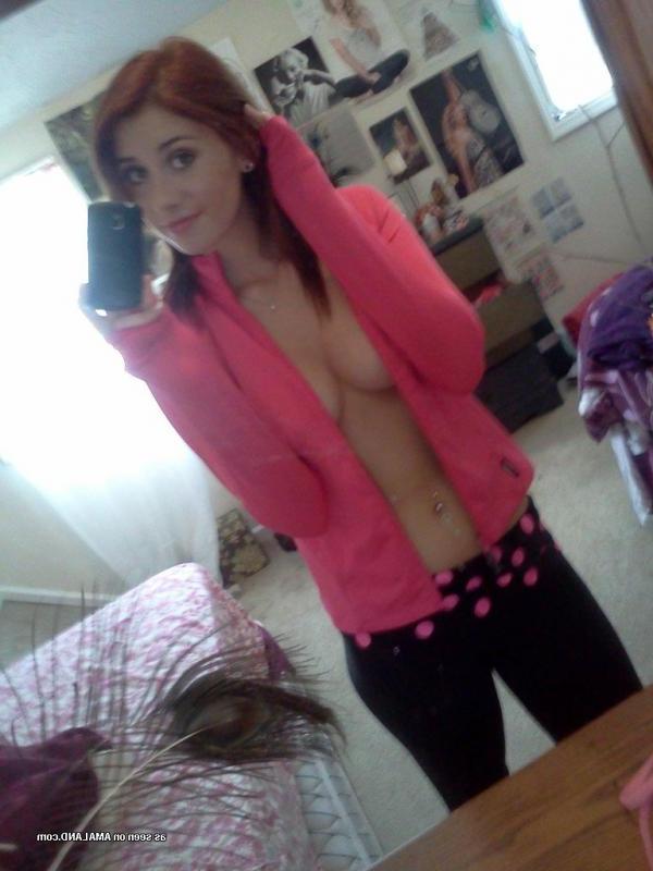 15P Redhead babe flashing her tits while camwhoring