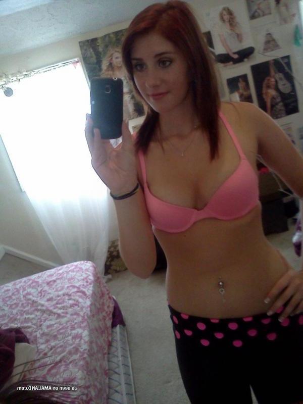 15P Redhead babe flashing her tits while camwhoring