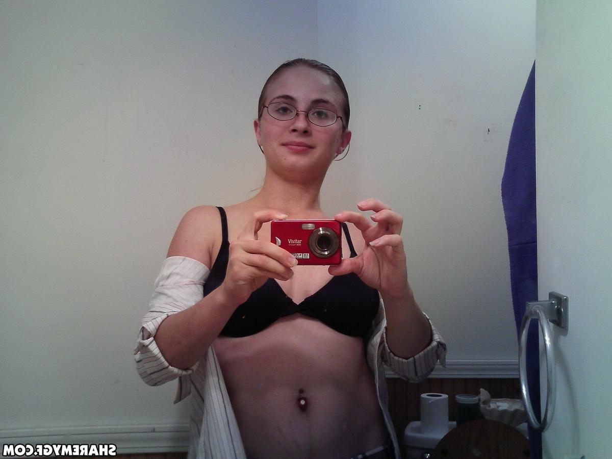 12P Horny girlfriend strips out of her school uniform in front of the mirror as she takes selfies