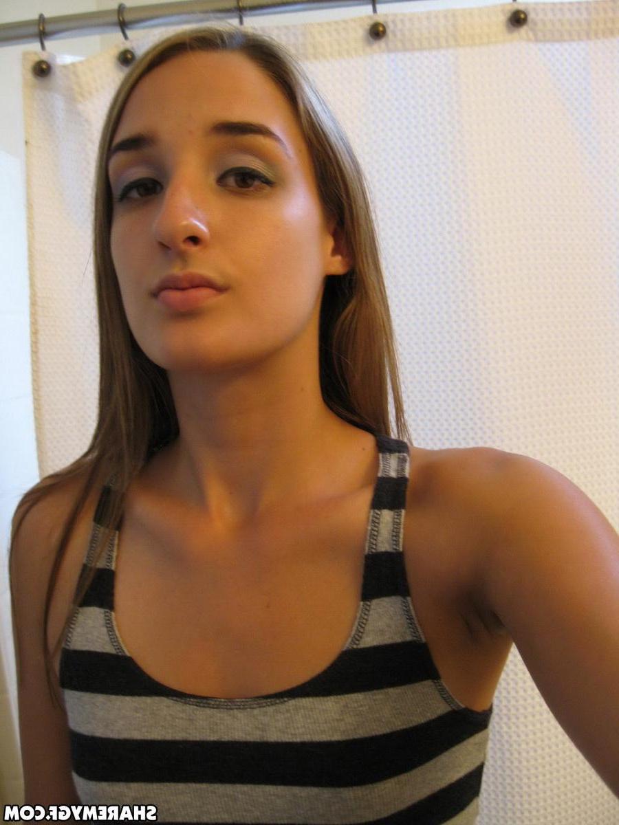 12P Cute girlfriend shows off her perky tits and round ass as she takes selfshot mirror pictures
