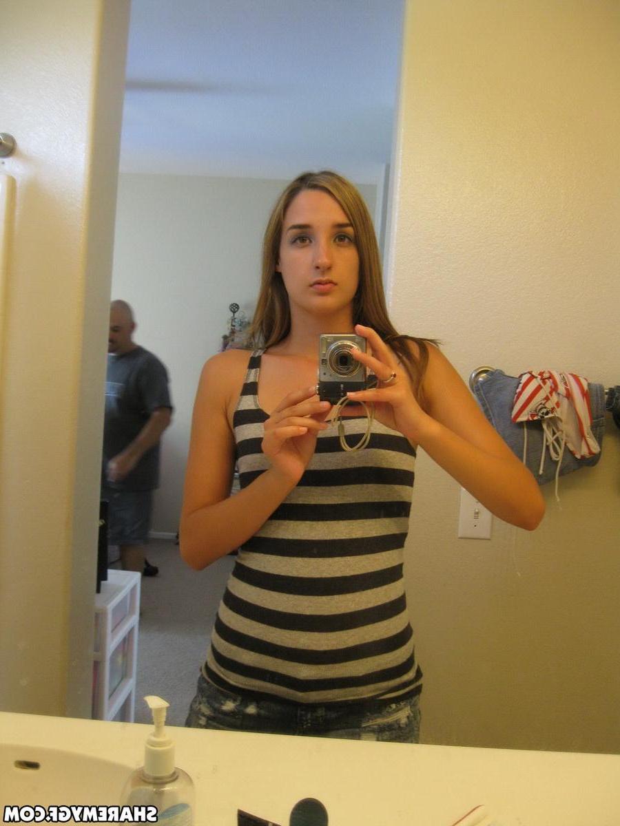 12P Cute girlfriend shows off her perky tits and round ass as she takes selfshot mirror pictures