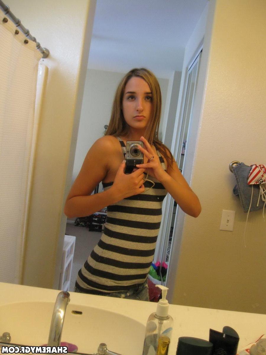 12P Cute girlfriend shows off her perky tits and round ass as she takes selfshot mirror pictures