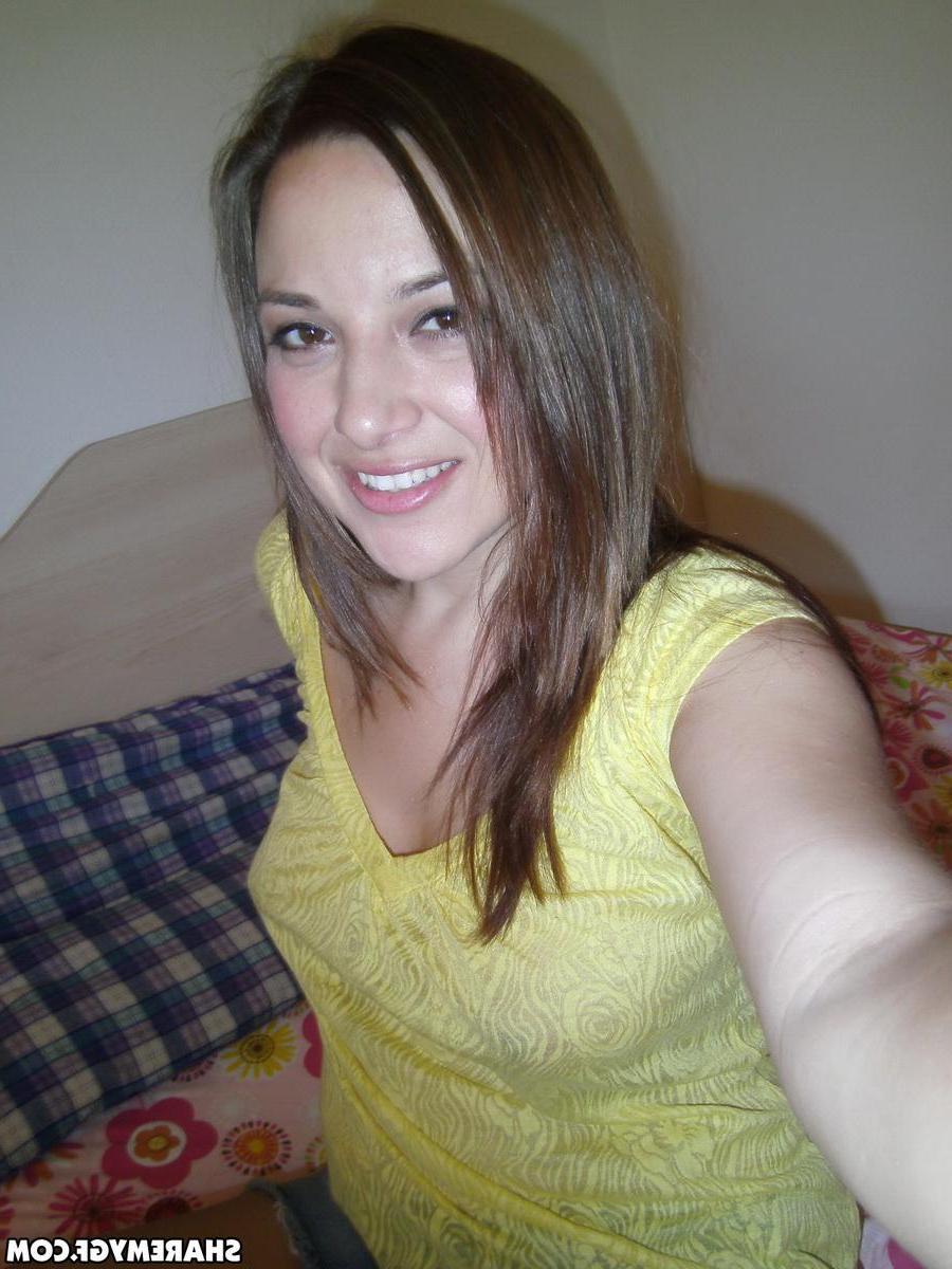 20P Hot brunette amateur takes selfies of her wet pussy
