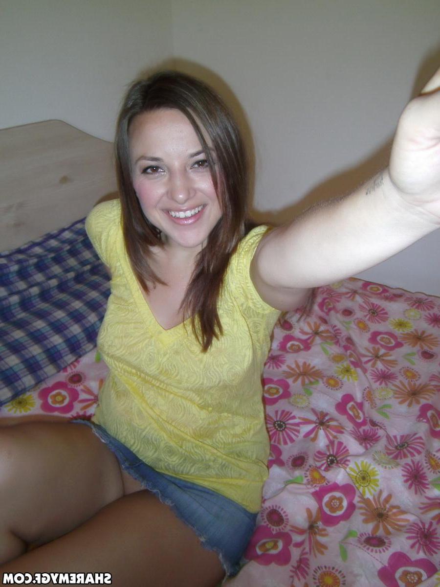 20P Hot brunette amateur takes selfies of her wet pussy
