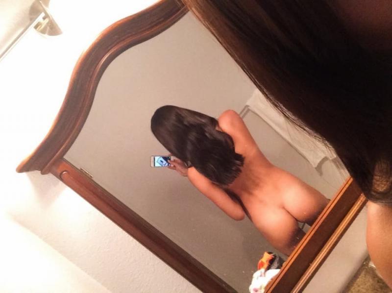 14P Naughty amateur babe shows off her hot body by posing naked