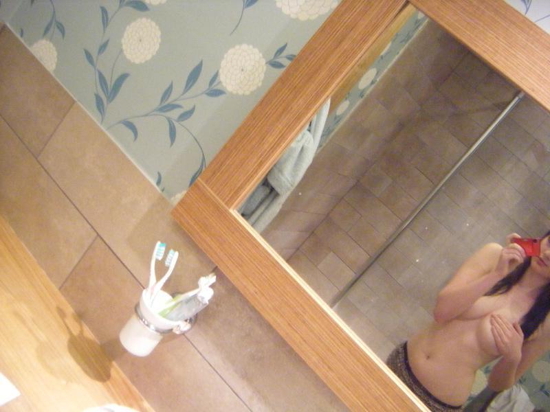 14P Naughty brunette GF with fine tits posing in lingerie