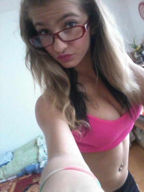 14P Teen with big round breasts poses in various sexy outfits
