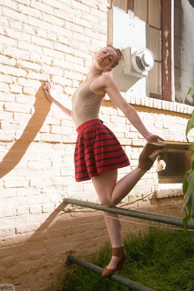 8P Pretty coed Julie Wheeler teases in her plaid skirt