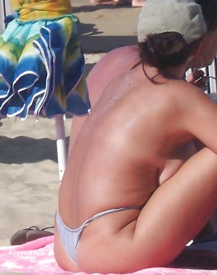 19P Beach babes greasy ass