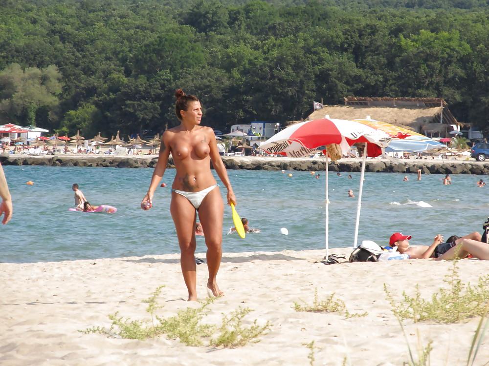 11P More from the faked tits on the beach