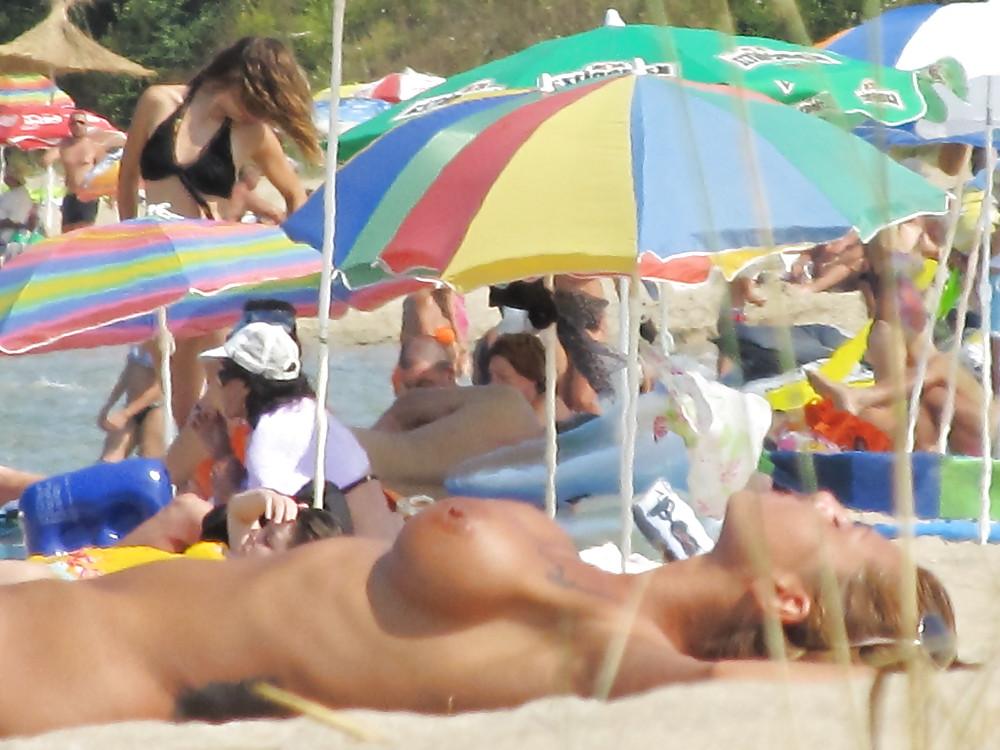 11P More from the faked tits on the beach
