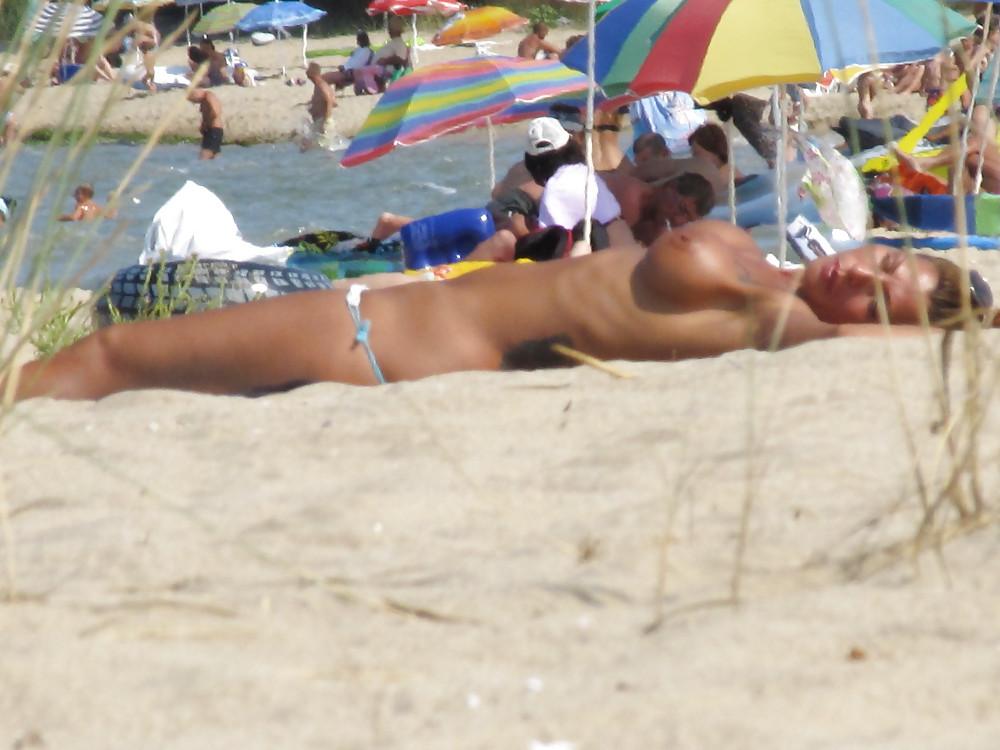 11P More from the faked tits on the beach